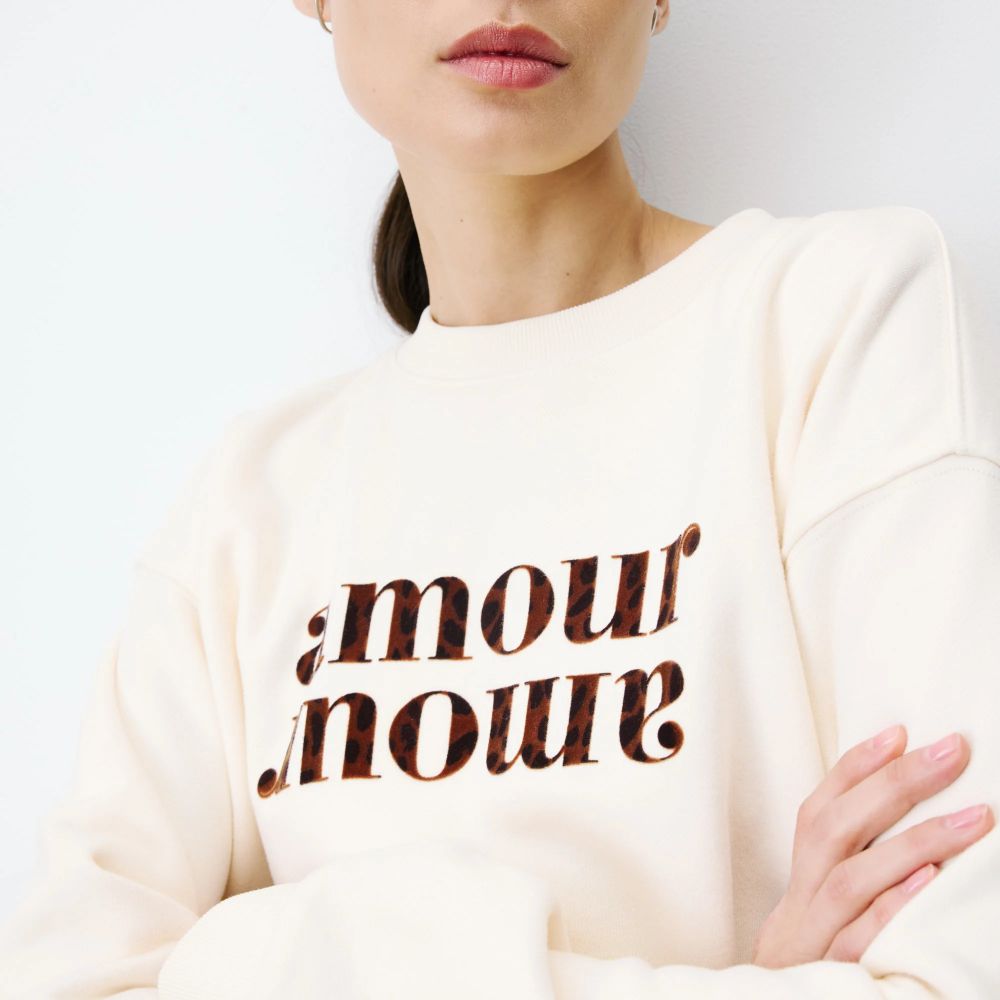 Sweat ample à message écru Amery